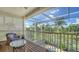 Relaxing screened lanai with water view and tropical landscaping, showcasing outdoor living at 12520 Natureview Cir, Bradenton, FL 34212