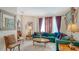 Comfortable and elegantly decorated living room features plush seating and ample natural light at 12520 Natureview Cir, Bradenton, FL 34212