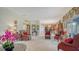 Spacious living room with plush carpeting and traditional decor throughout at 12520 Natureview Cir, Bradenton, FL 34212