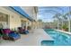 Lounge on the patio and enjoy poolside bliss in this outdoor retreat offering refreshing shade and easy access to indoor comfort at 12520 Natureview Cir, Bradenton, FL 34212