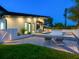 Beautiful backyard features a pool, outdoor grill area, and lounge chairs for ultimate relaxation and enjoyment at 1323 Loma Linda Ct, Sarasota, FL 34239