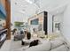 Open concept living area with modern furnishings and views of the backyard at 1323 Loma Linda Ct, Sarasota, FL 34239