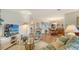 Cozy living room with comfortable seating, stylish decor, and wood flooring at 1334 De Prie Rd, Englewood, FL 34223