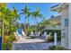 Community fire pit area surrounded by comfortable seating and lush landscaping, perfect for gatherings at 13549 Old Creek Ct, Parrish, FL 34219