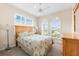 Bright bedroom with plantation shutters offering lots of natural light at 138 Tiziano Way, North Venice, FL 34275