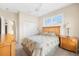 Bright bedroom with plantation shutters providing natural light at 138 Tiziano Way, North Venice, FL 34275