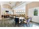 Elegant clubhouse interior featuring a bar, seating, and sophisticated decor at 138 Tiziano Way, North Venice, FL 34275
