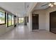 Bonus room with tile flooring, sliding glass windows and yard view at 1409 57Th W St # 1409, Bradenton, FL 34209