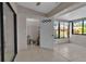 Bonus room has sliding glass windows, tile flooring and a closet at 1409 57Th W St # 1409, Bradenton, FL 34209