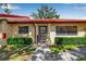 Charming single-story home with a well-manicured lawn and lush landscaping at 1409 57Th W St # 1409, Bradenton, FL 34209