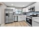 Beautiful updated kitchen with stainless steel appliances and modern cabinetry at 1409 57Th W St # 1409, Bradenton, FL 34209