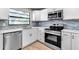 Well-appointed kitchen with stainless steel appliances and sleek countertops at 1409 57Th W St # 1409, Bradenton, FL 34209