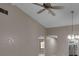 Spacious living room with light colored walls, ceiling fan and decorative lighting at 1409 57Th W St # 1409, Bradenton, FL 34209