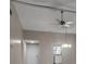 Spacious living room with light colored walls, ceiling fan and decorative lighting at 1409 57Th W St # 1409, Bradenton, FL 34209