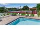 Relaxing pool area with tennis courts, perfect for leisure and recreation at 1409 57Th W St # 1409, Bradenton, FL 34209