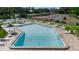 Community pool and tennis court, offering recreation and relaxation for residents at 1409 57Th W St # 1409, Bradenton, FL 34209