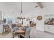 Dining room area leading to modern kitchen and office space at 14257 Heritage Landing Blvd # 1122, Punta Gorda, FL 33955