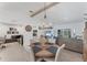 Dining room with wood table and chairs, illuminated by a modern chandelier at 14257 Heritage Landing Blvd # 1122, Punta Gorda, FL 33955