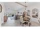 Open-concept living space with natural light and slider door to outside deck at 14257 Heritage Landing Blvd # 1122, Punta Gorda, FL 33955