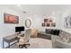 A functional home office provides a quiet workspace with desk and chair at 14257 Heritage Landing Blvd # 1122, Punta Gorda, FL 33955