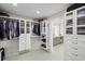 Spacious walk-in closet with custom shelving and storage solutions at 1527 Buoy Ln, Osprey, FL 34229