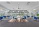 Spacious club room featuring plenty of seating and view to outdoor amenities at 1527 Buoy Ln, Osprey, FL 34229