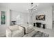 Comfortable living room area with modern furnishings, decor, and lots of natural light at 1527 Buoy Ln, Osprey, FL 34229