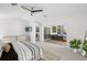 Bright main bedroom featuring neutral decor, outdoor access, and lots of natural light at 1527 Buoy Ln, Osprey, FL 34229