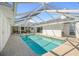Relaxing screened-in pool and deck area with spacious layout and seamless access to the interior living spaces at 1527 Buoy Ln, Osprey, FL 34229