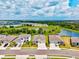 Aerial view of homes in a lakeside community, showcasing the attractive neighborhood layout at 17547 Cantarina Cv, Bradenton, FL 34211