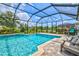 The pool's sparkling water and inviting seating area provide a perfect setting for outdoor relaxation and entertainment at 17547 Cantarina Cv, Bradenton, FL 34211