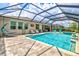 The covered pool and patio area has space for a private oasis for swimming, lounging, and outdoor enjoyment at 17547 Cantarina Cv, Bradenton, FL 34211