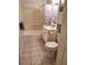 Cozy bathroom with classic fixtures, tile flooring, and a shower-tub combo at 204 36Th W St, Bradenton, FL 34205