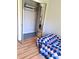 Bedroom with mirror closet and hardwood floors at 204 36Th W St, Bradenton, FL 34205