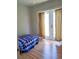 Inviting bedroom with hardwood floors and french doors, providing access to outdoor area at 204 36Th W St, Bradenton, FL 34205