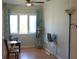Cozy living room with hardwood floors and a seating area near a bright window at 204 36Th W St, Bradenton, FL 34205