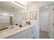 Modern bathroom with double sinks, quartz countertops, and a large mirror at 2081 Basin St, Port Charlotte, FL 33952