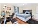 Bedroom with hardwood floors, an office nook, and neutral decor at 2105 19Th W St, Bradenton, FL 34205