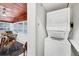 Efficient laundry area with stacked washer and dryer units, saving space in a compact design at 2105 19Th W St, Bradenton, FL 34205