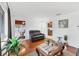 Spacious living room with hardwood floors, comfortable seating and access to other rooms at 2105 19Th W St, Bradenton, FL 34205