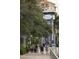 Scenic Bradenton Riverwalk featuring lush landscaping and pedestrian pathways near residential building at 2105 19Th W St, Bradenton, FL 34205