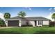 Charming single-story home featuring a well-manicured lawn and an attached two-car garage at 23327 Van Buren Ave, Punta Gorda, FL 33980