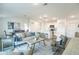 Open-concept living area seamlessly connects the living room, dining space, and kitchen at 23487 Avacado Ave, Port Charlotte, FL 33980