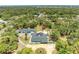 Expansive property featuring a pool, a detached garage, and a circular driveway with a fountain at 2726 Desoto Rd, Sarasota, FL 34234