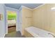 Bathroom featuring a soaker tub with access to the bedroom at 2726 Desoto Rd, Sarasota, FL 34234