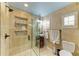 Bathroom featuring tiled glass enclosed shower, sink, and toilet at 2726 Desoto Rd, Sarasota, FL 34234