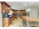 Lovely kitchen featuring stainless appliances, granite counters, and a view to a living area at 2726 Desoto Rd, Sarasota, FL 34234