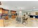 Bright kitchen with a central island, stainless appliances, and views into the adjoining living room at 2726 Desoto Rd, Sarasota, FL 34234