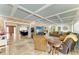 Expansive living room with coffered ceilings, tile flooring, and seamless transitions to other areas at 2726 Desoto Rd, Sarasota, FL 34234