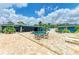 Inviting backyard pool and patio area with outdoor seating, great for relaxation and gatherings at 2726 Desoto Rd, Sarasota, FL 34234